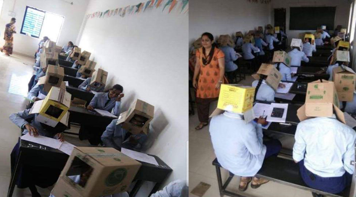 іспит з картонними коробками на головах