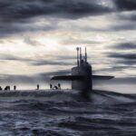 По меньшей мере трое пострадали в результате столкновения подводной лодки с торговым судном в Японии По меньшей мере трое пострадали в результате столкновения подводной лодки с торговым судном в Японии